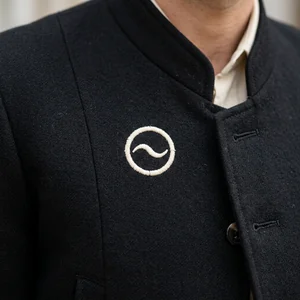 Escudo de club bordado en la chaquetilla